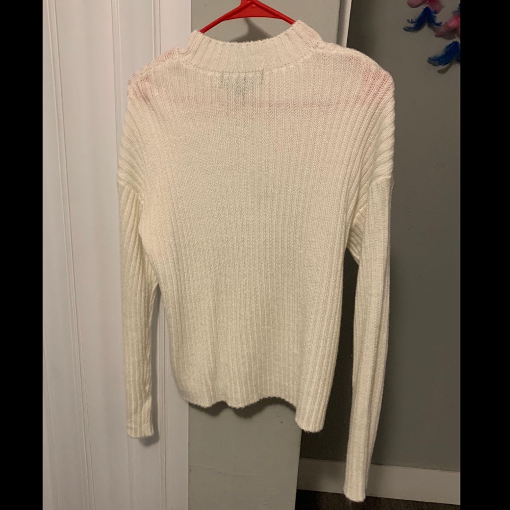 white sweater